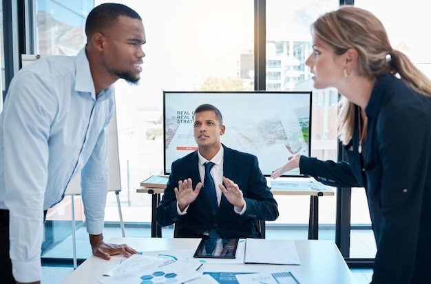 Business fight team argument and angry lawyer dispute of corporate lawyers fighting in a meeting Stress anger and frustrated working colleagues over a client contract or opposite strategy opinion