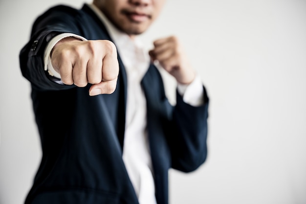 Business Fighting to success Concept. Businessman with fighting pose.