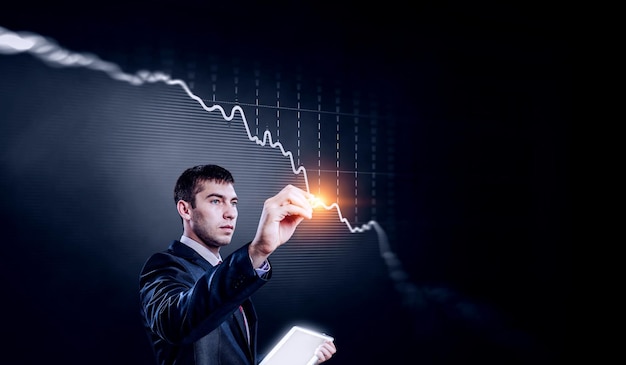 Business graph and trade monitor. Mixed media