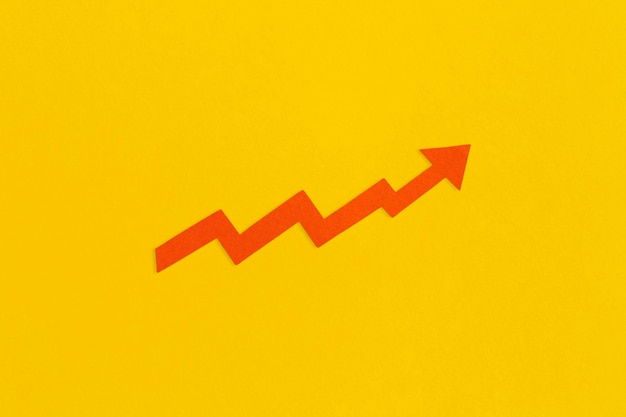 Business growth concept. Financial report with graphs and arrow.