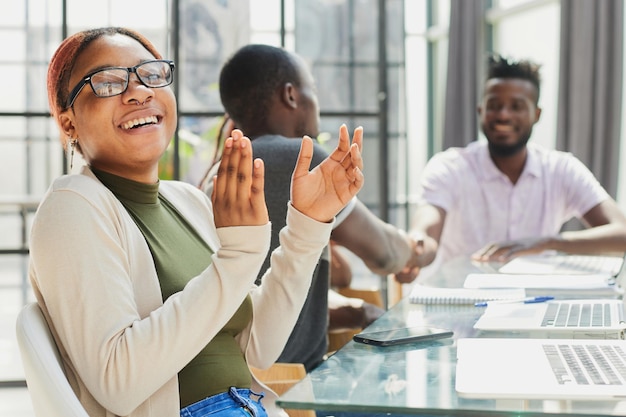 Business handshake in the office african american team