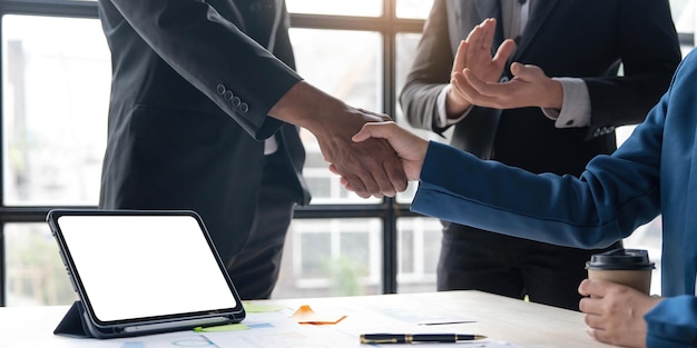 Business handshake for teamwork of business merger and acquisitionsuccessful negotiatehand shaketwo businessman shake hand with partner to celebration partnership and business deal concept