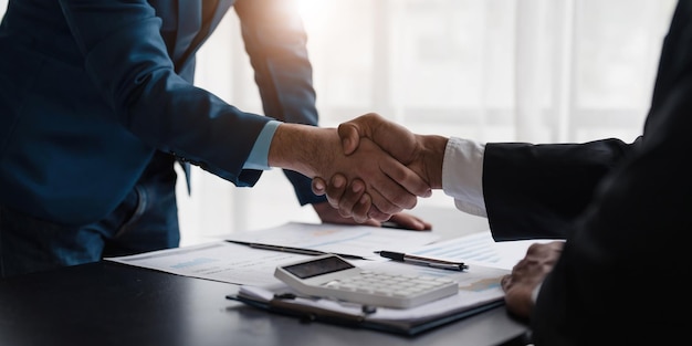 Business handshake for teamwork of business merger and acquisitionsuccessful negotiatehand shaketwo businessman shake hand with partner to celebration partnership and business deal conceptx9