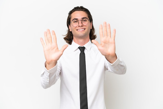 Business handsome man isolated on white background counting ten with fingers