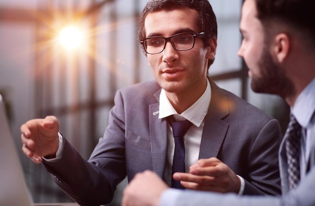 Business having meeting around table in modern office