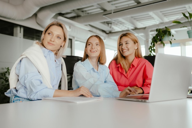 Business ladies following a presentation together