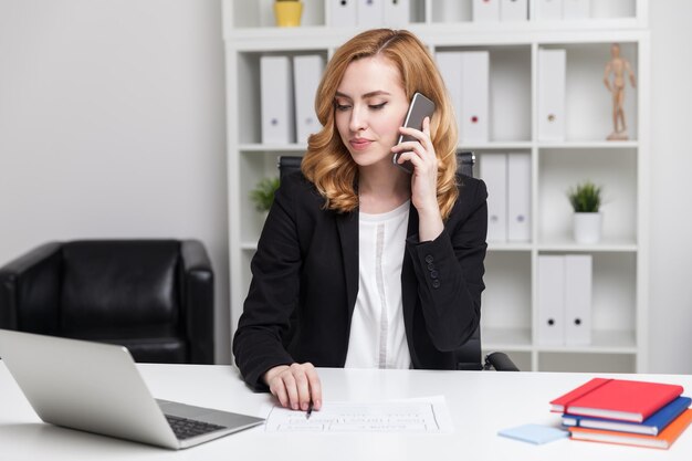 Business lady on her phone