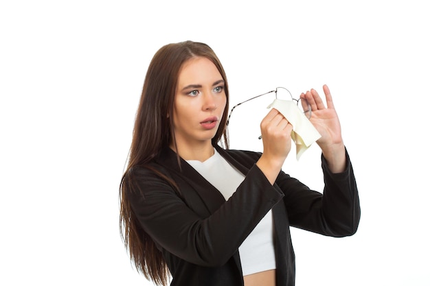 A business lady is wiping her glasses Isolated on white background