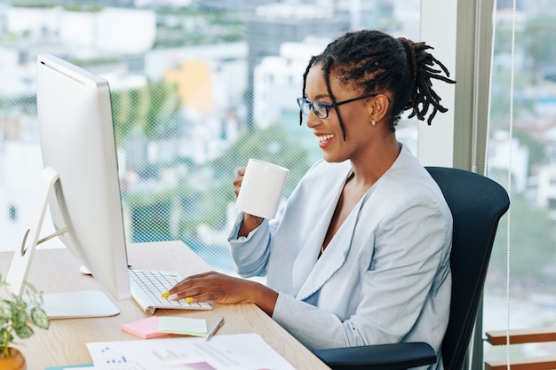 Business lady readinh funny messages