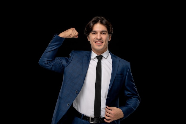 Business man cute charismatic man in dark blue outfit with the tie showing biceps off