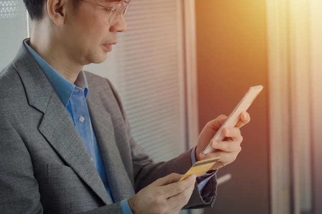 Business man discuss project and use mobile phone at workplace