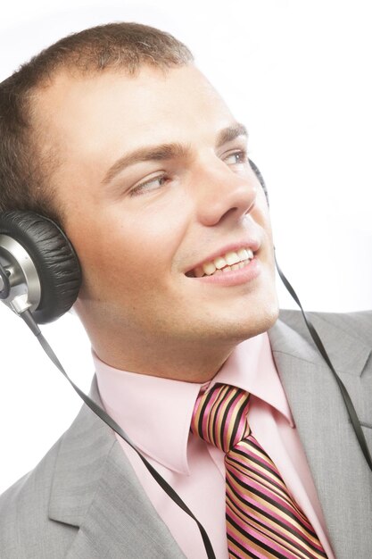 Business man enjoying pleasant music