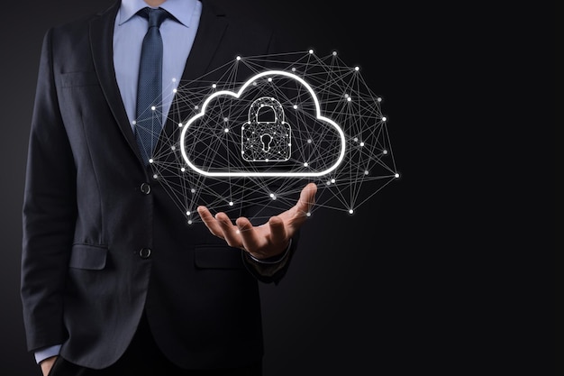 Business man hold,holding cloud computing data and security on global networking,Padlock and cloud icon. Technology of business.Cybersecurity and information or network protection.internet project