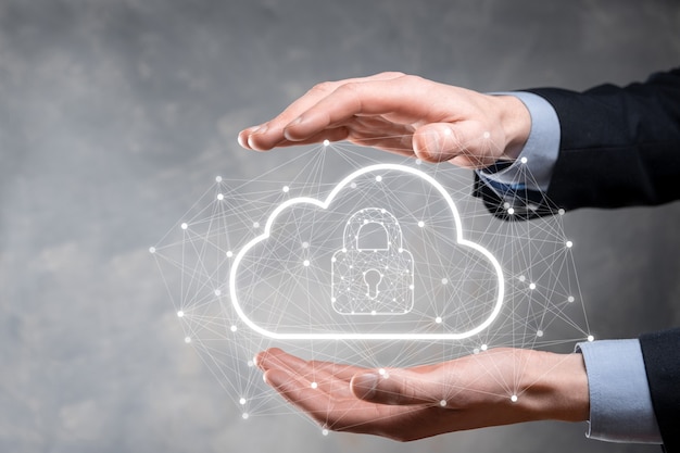 Business man hold,holding cloud computing data and security on global networking,Padlock and cloud icon. Technology of business.Cybersecurity and information or network protection.internet project.