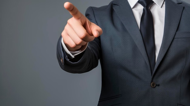 Business man points his finger at you Businessman pointing with finger with copy space