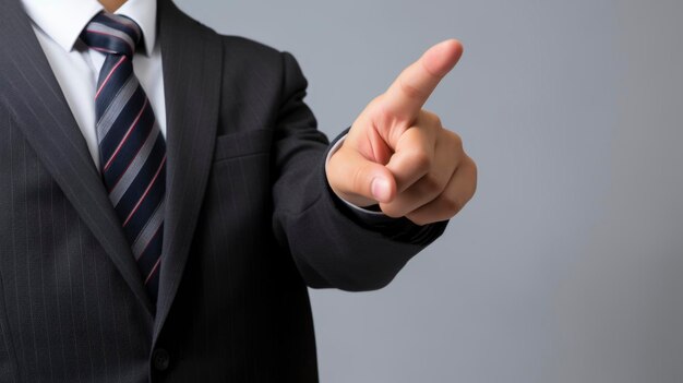 Business man points his finger at you Businessman pointing with finger with copy space