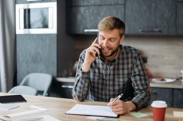 Business man sitting at a table in a coworking center