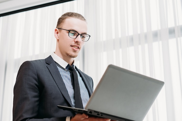 Business man in smart suit working in office