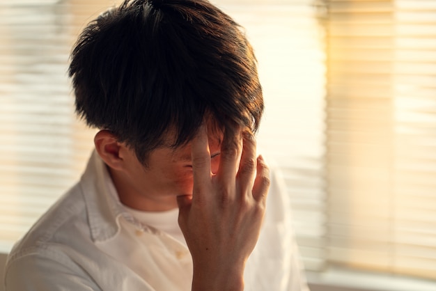 Business man stress and worry about late time to finish working project