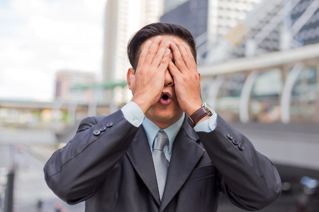 Business man tired or stressed after his work. Image of Stressed businessman concept.