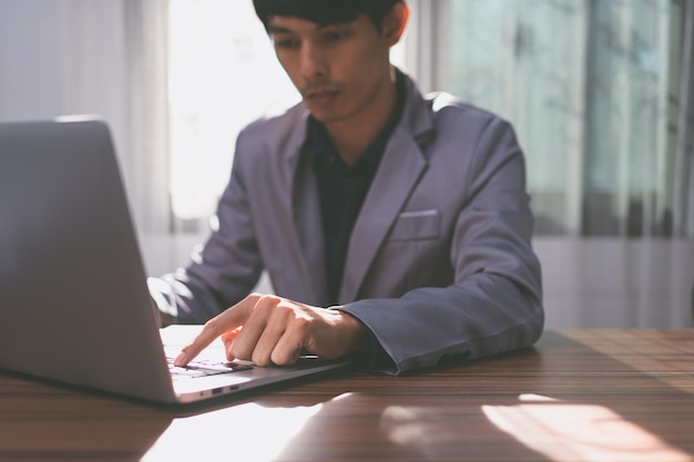 Business man use a computer to work