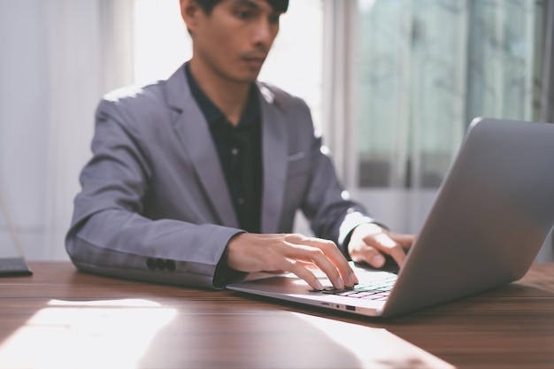 Business man use a computer to work