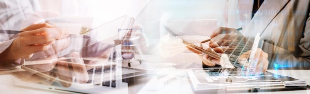 Business man using credit card and calculator for shopping online selective focus