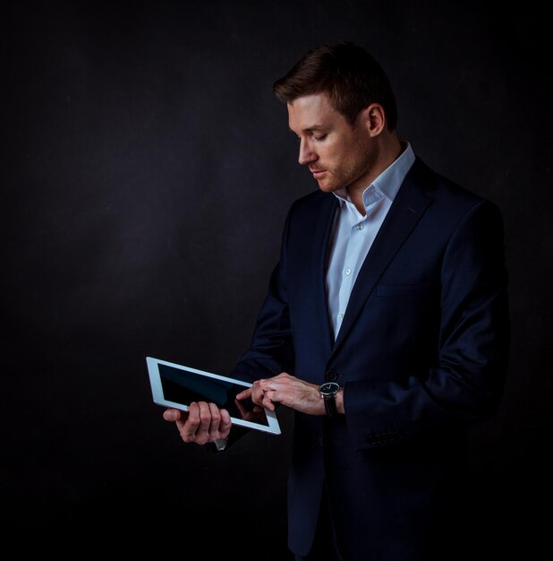 Business man using digital tablet