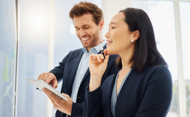 Business man woman and glass for planning notes or happy for brainstorming in office Japanese businesswoman businessman and tablet with diversity moodboard and collaboration for strategy