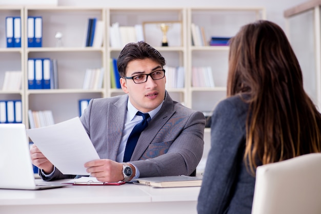 Business meeting between businessman and businesswoman