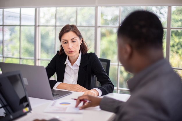 Business Meeting - Manager Discussing Work With His Colleagues