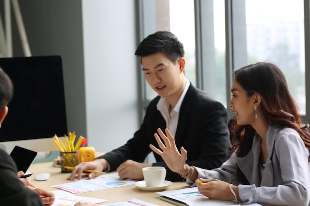 Business Meeting Talking With Colleagues In Office