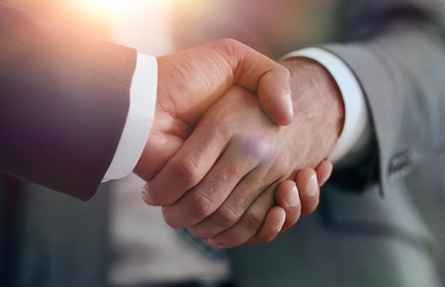 Business men giving a handshake business concept