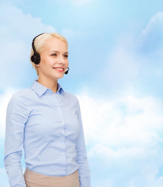 business and office concept - friendly female helpline operator with headphones