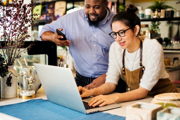 Business owner is using laptop