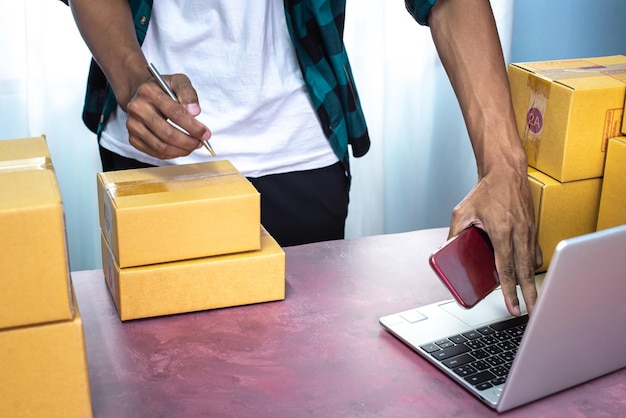 business owner working checking order to confirm before sending customer in post Online selling