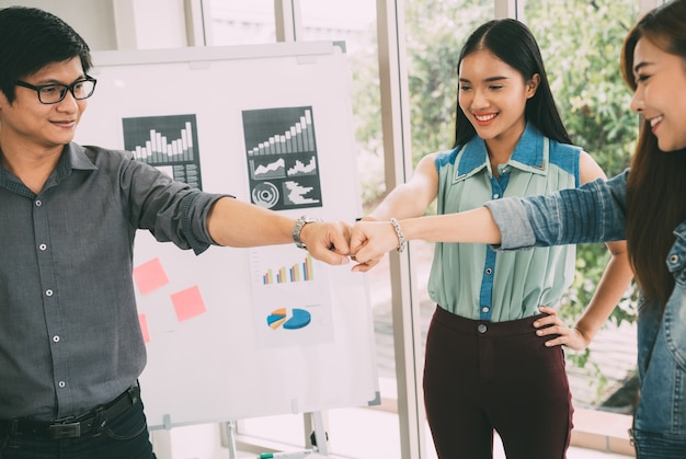 Business Partners Giving Fist Bump to complete mission successful deal together 