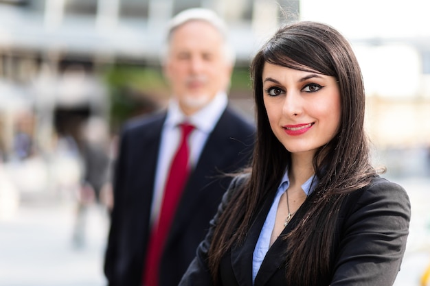 Business partners outdoor in a modern urban setting in daylight