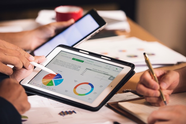 Business people analysis graph report in the office room