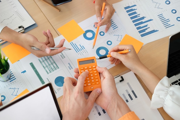 Business people discussing on performance revenue in meeting. businessman working with businesswoman.