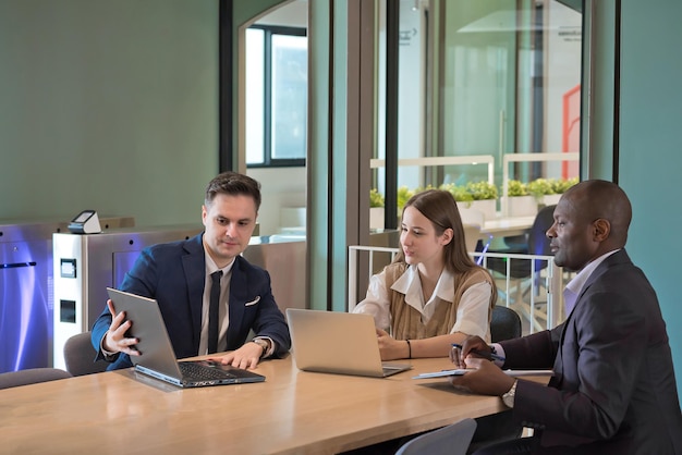 Business people or diverse colleagues working and meeting in modern office