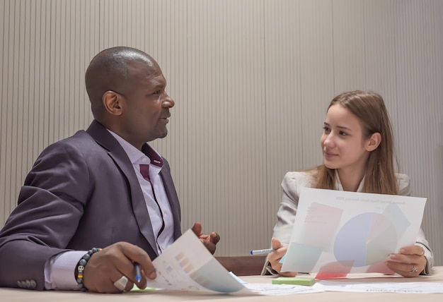 Business people or diverse colleagues working and meeting in modern office