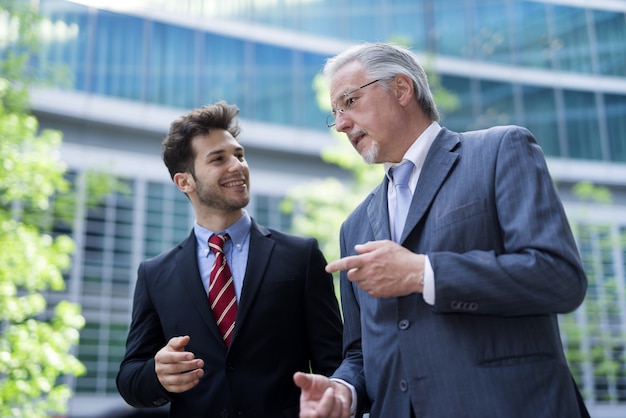 Business people having a conversation outdoors