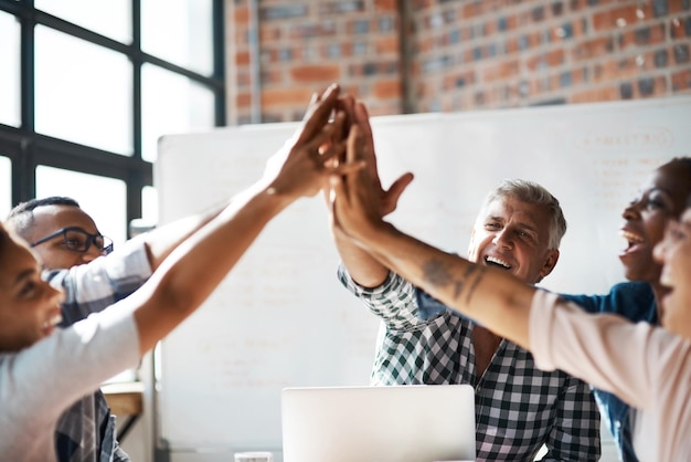 Photo business people high five and happy at meeting celebration and connection in support with diversity men woman and solidarity in scrum with teamwork synergy and link with motivation at startup