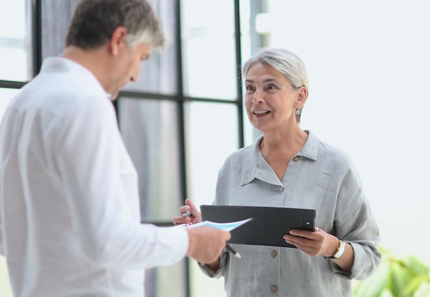 Business people meet in the office and discuss joint business projects