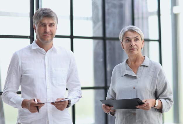 Business people meet in the office and discuss joint business projects