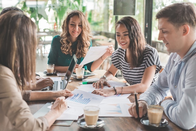 Business people meeting in coffee shop. diverse people partner and teamwork