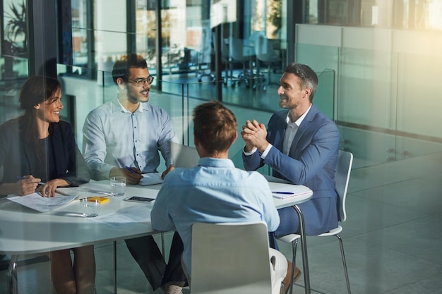 Business people meeting and discussion for corporate planning strategy or brainstorming at the office Group of employee workers in business meeting team planning or collaboration at the workplace