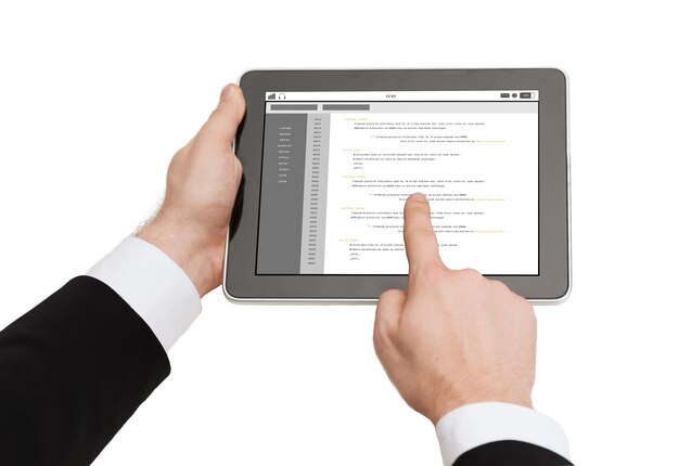 business, people, programming and technology concept - close up of man hands holding tablet pc computer with coding on screen