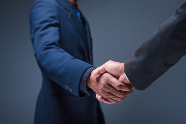 Business people shake hands in the office